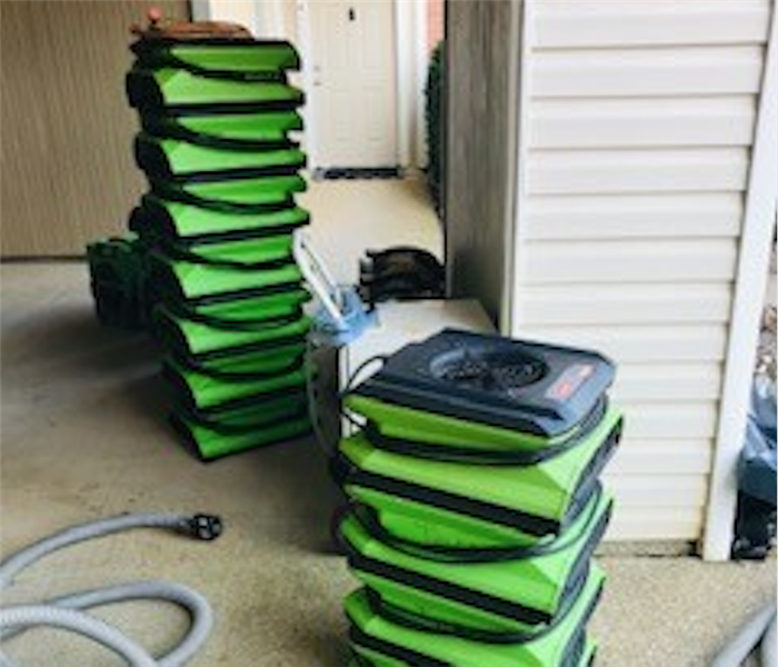 Drying equipment placed by entrance to apartment.